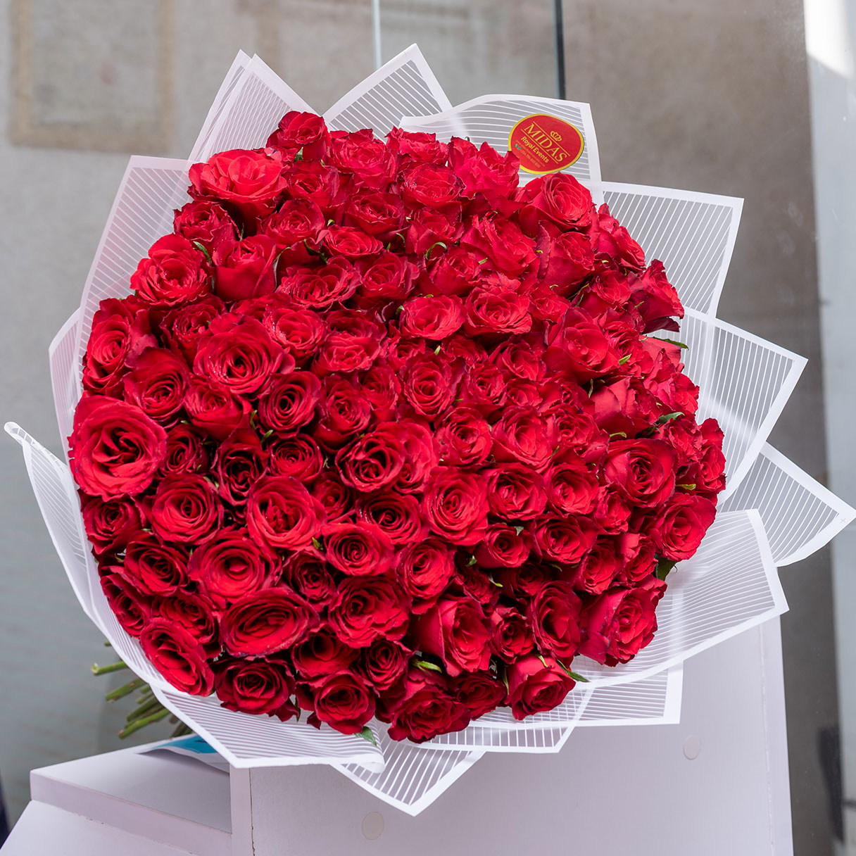 A Garden of Red Roses 100 Stem Bouquet - Midas Flowers Delivery